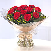 Secret admirer bouquet, a dozen long stemmed red roses
