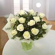 A bouquet of a dozen white roses